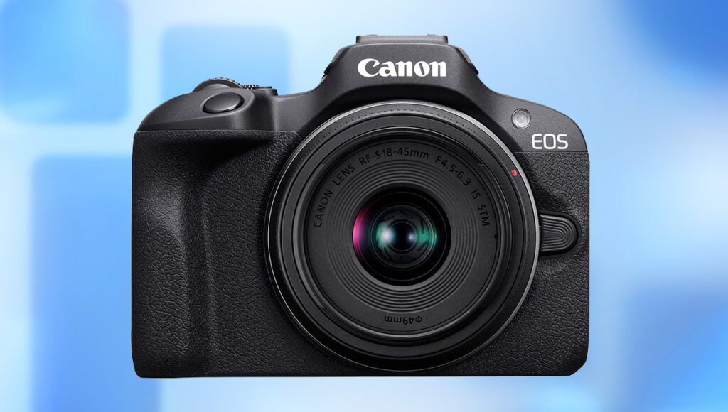 Stock image of the Canon EOS R100 Mirrorless Camera with Imaging Resource style background