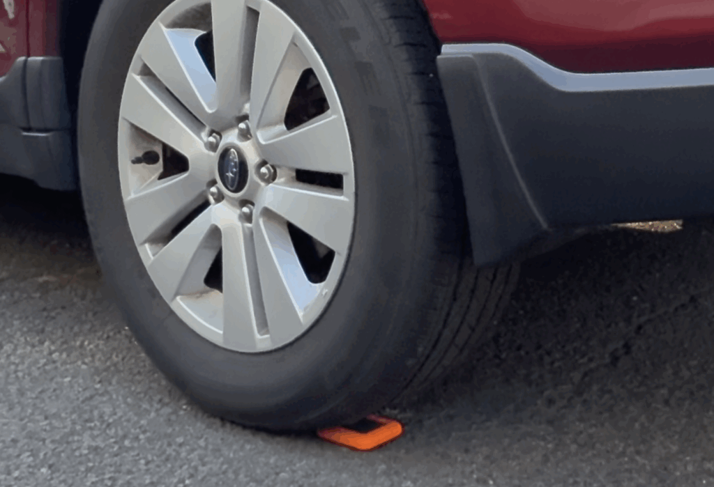 LaCie Rugged4 under the wheel of a red car